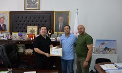 Kars Gençlik ve Spor İl Müdürü Mehmet Başköylü'den başarılı personele takdirname